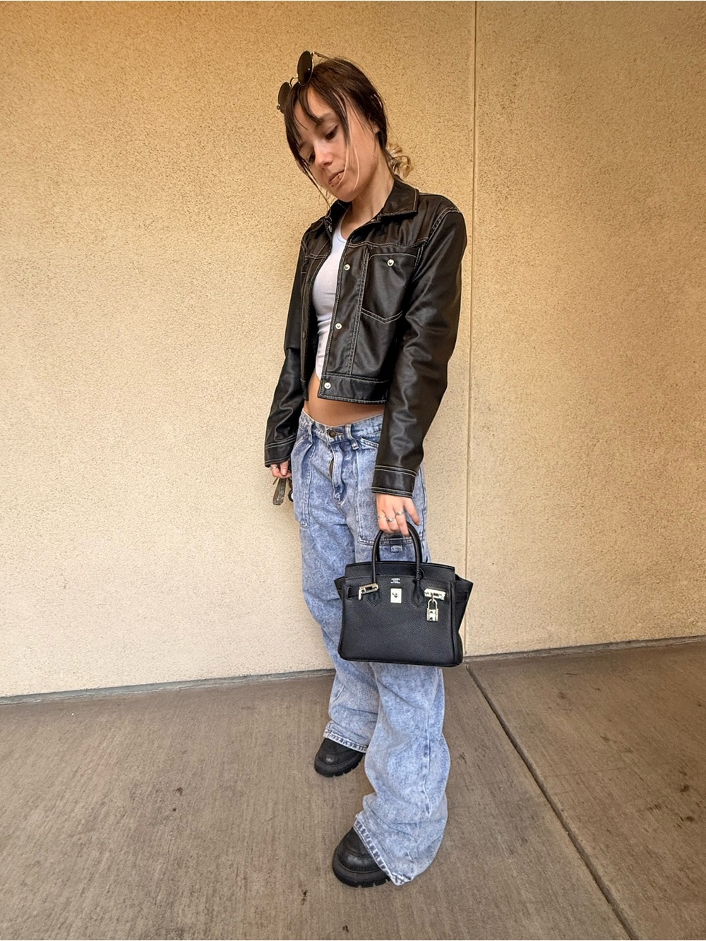 Birkin Hermes black leather bag with Hermes Pegasus charm